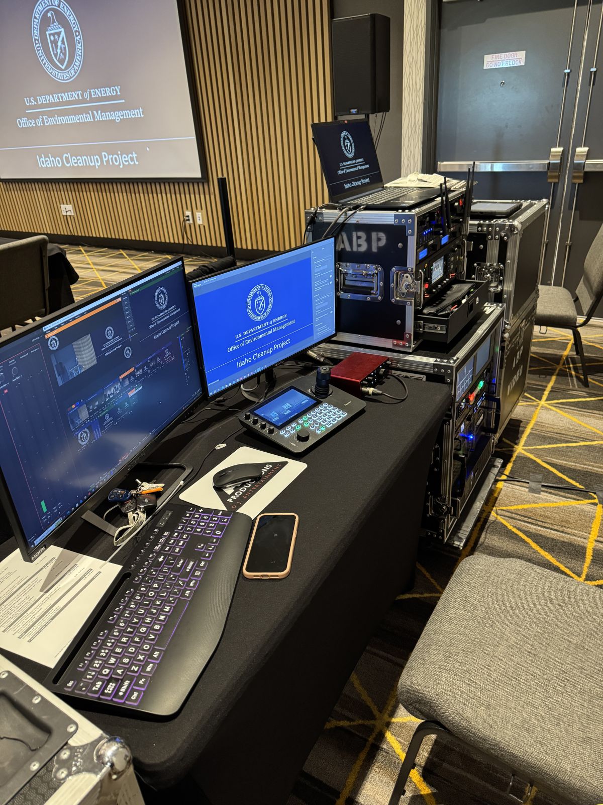 A&B Productions streaming desk with camera monitors, a video switcher and a stream controller set up for a meeting